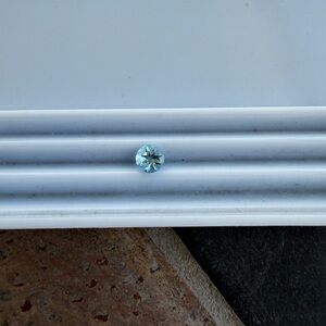 Blue Aquamarine 6mm round Gemstone .69 carats